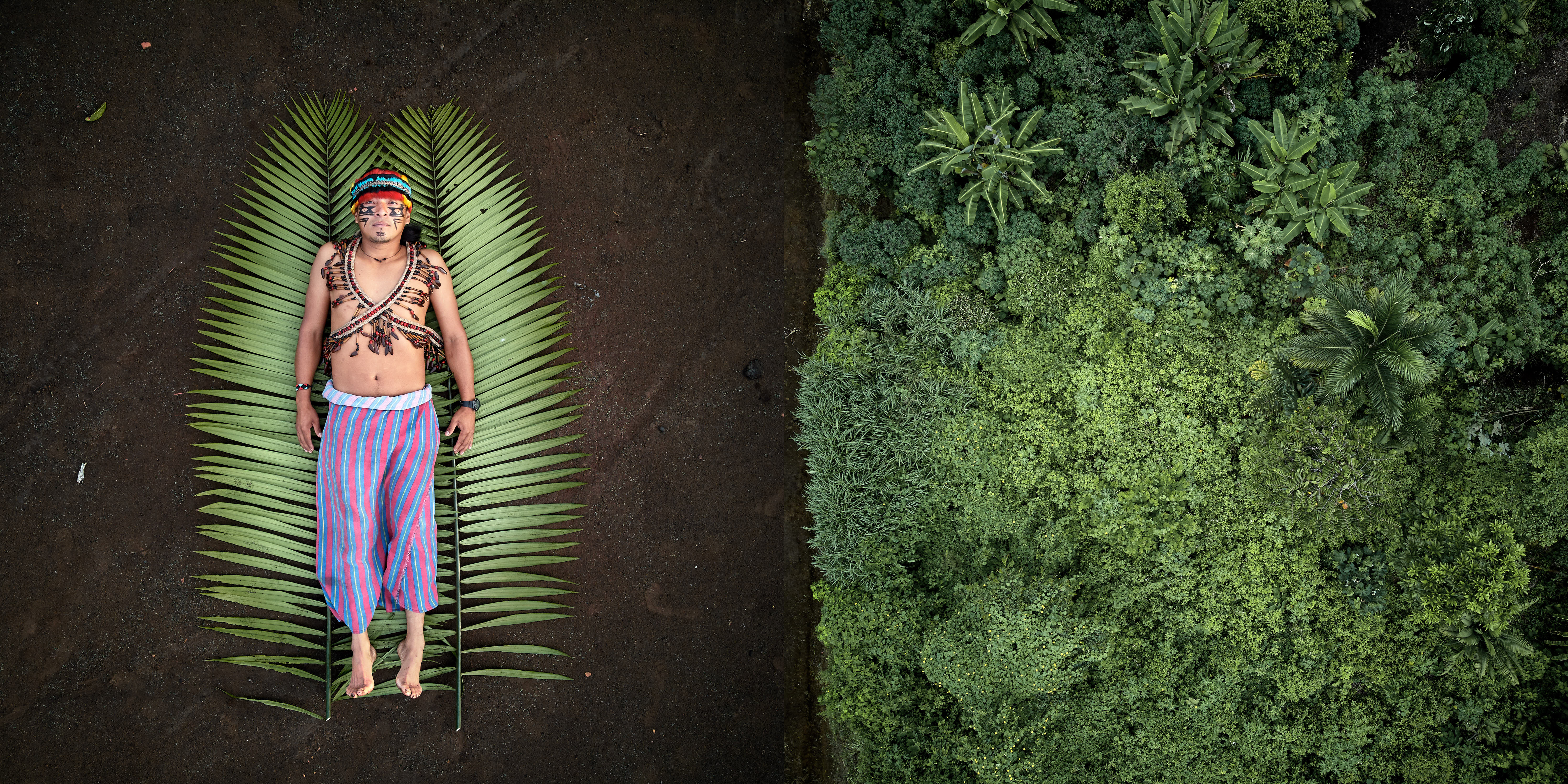 Nantu is an indigenous young man from the Achuar Nation of Ecuador who leads a project of solar-powered river boats for collective transport. By installing solar panels on a specially designed boat’s roof, he is working to end Achuar’s dependence on petrol. Left: On his land, Nantu lies dressed with traditional Achuar clothing. Right: the pristine rainforest from the Achuar territory. Sharamentsa, Pastaza, Ecuador. Photo-composition: Pablo Albarenga